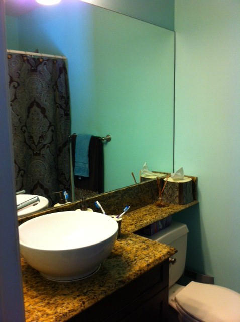 1068 Jeffery Street Boca Raton, FL 33487 - Photo 10 of 13 a bathroom with a granite countertop sink and a toilet