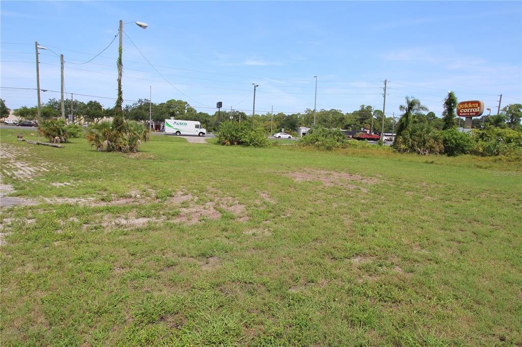 8900 U.S. Highway 19 Port Richey, FL 34668 - Photo 18 of 27 a view of a green field