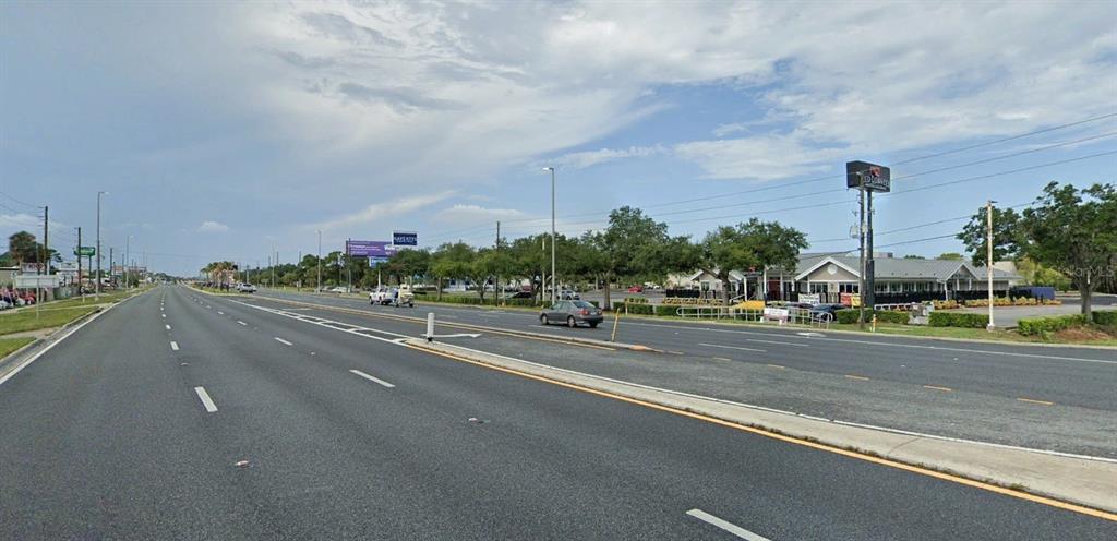 8900 U.S. Highway 19 Port Richey, FL 34668 - Photo 7 of 27 a view of a city street with a apartment