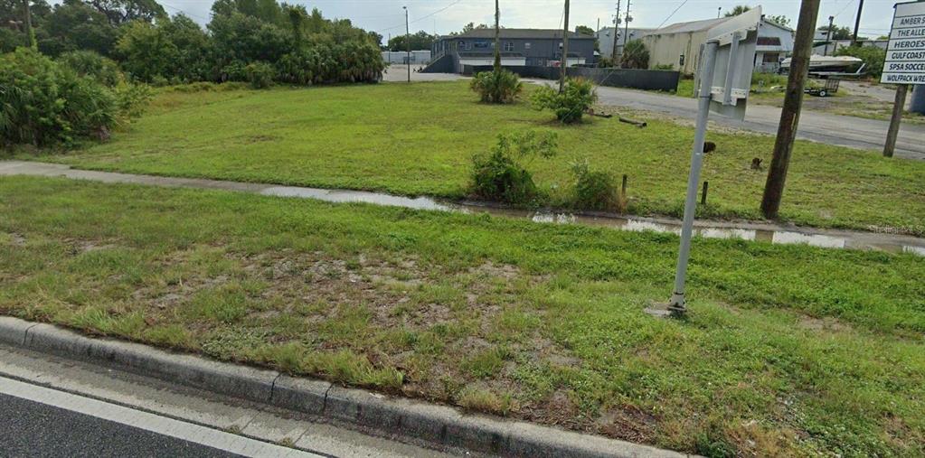 8900 U.S. Highway 19 Port Richey, FL 34668 - Photo 9 of 27 a view of a garden from a window