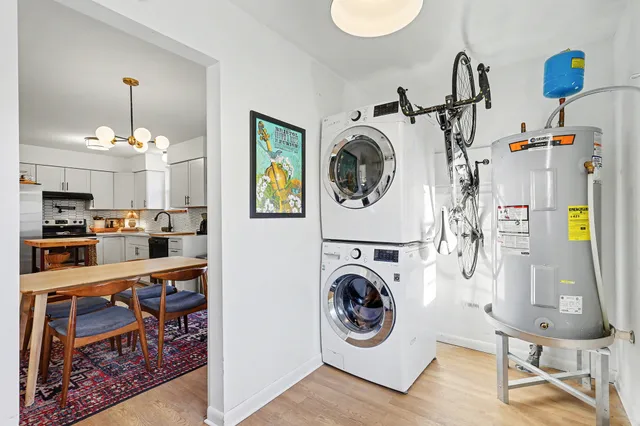 a view of a kitchen with washer and dryer
