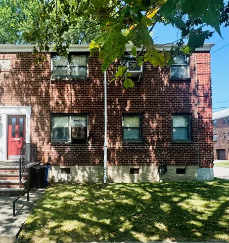 a swimming pool with outdoor seating and yard