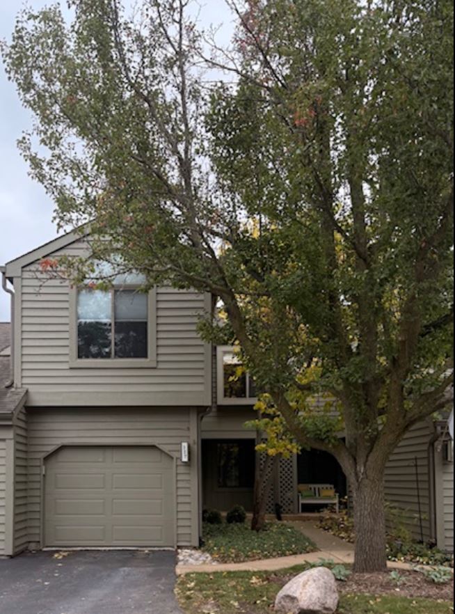 357 Indian Point Lake Barrington, IL 60010 - Photo 1 of 14 a view of a house with a large tree