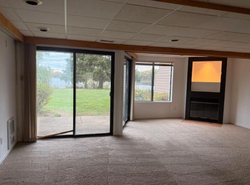 357 Indian Point Lake Barrington, IL 60010 - Photo 6 of 14 a view of an empty room with a window