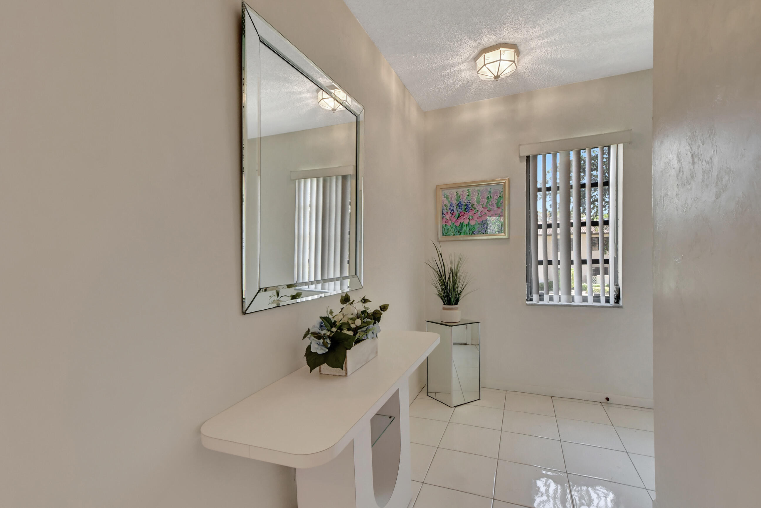 21411 Juego Circle, Unit 32H Boca Raton, FL 33433 - Photo 3 of 41 foyer