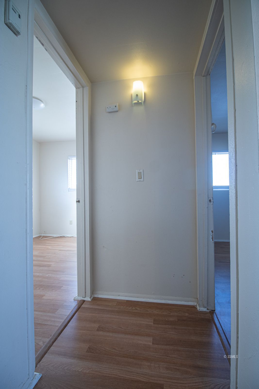 1621 Sims Street Ridgecrest, CA 93555 - Photo 11 of 24 a view of a room with wooden floor