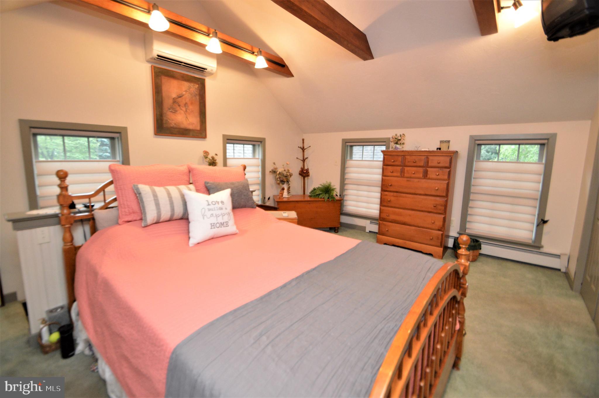 1741 Lebanon Road Manheim, PA 17545 - Photo 22 of 46 Vaulted ceiling in primary bedroom. 2nd staircase.