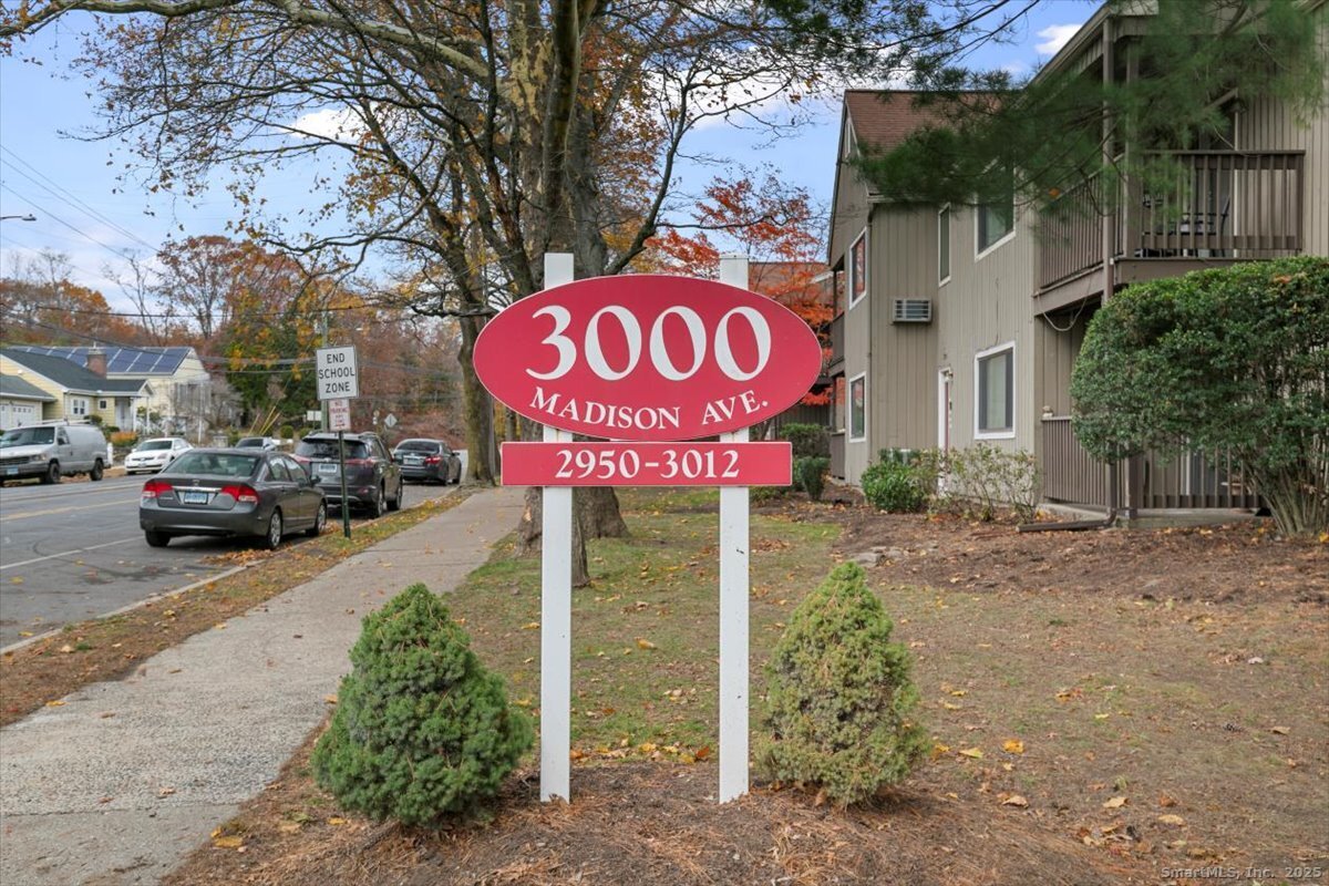 2998 Madison Avenue, Unit C Bridgeport, CT 06606 - Photo 1 of 24 a sign on the side of a road
