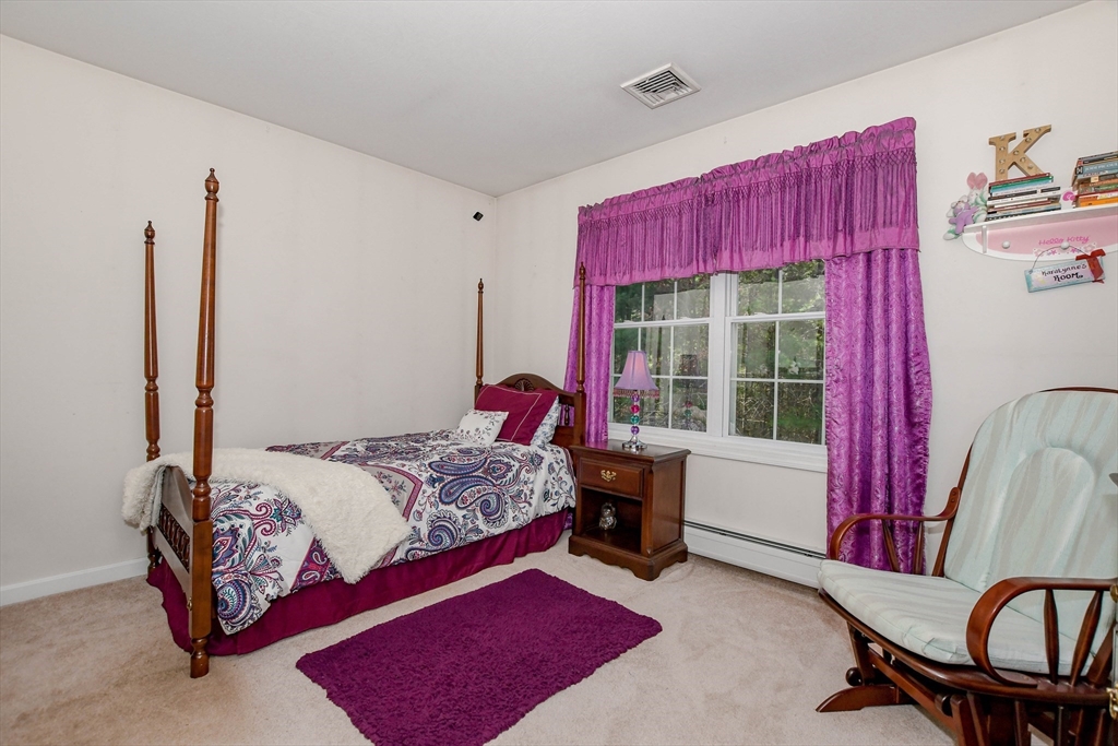 57 Harvest Circle Wareham, MA 02576 - Photo 26 of 39 a bedroom with a bed and a window
