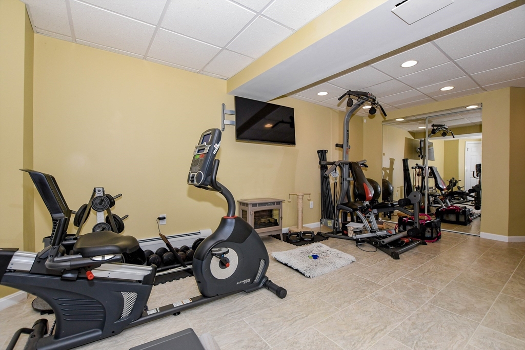 57 Harvest Circle Wareham, MA 02576 - Photo 31 of 39 a view of a room with gym equipment