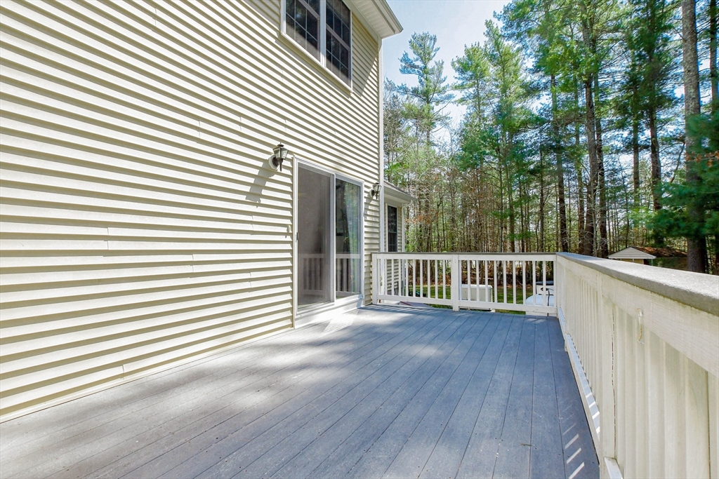 57 Harvest Circle Wareham, MA 02576 - Photo 34 of 39 a view of a balcony with wooden floor