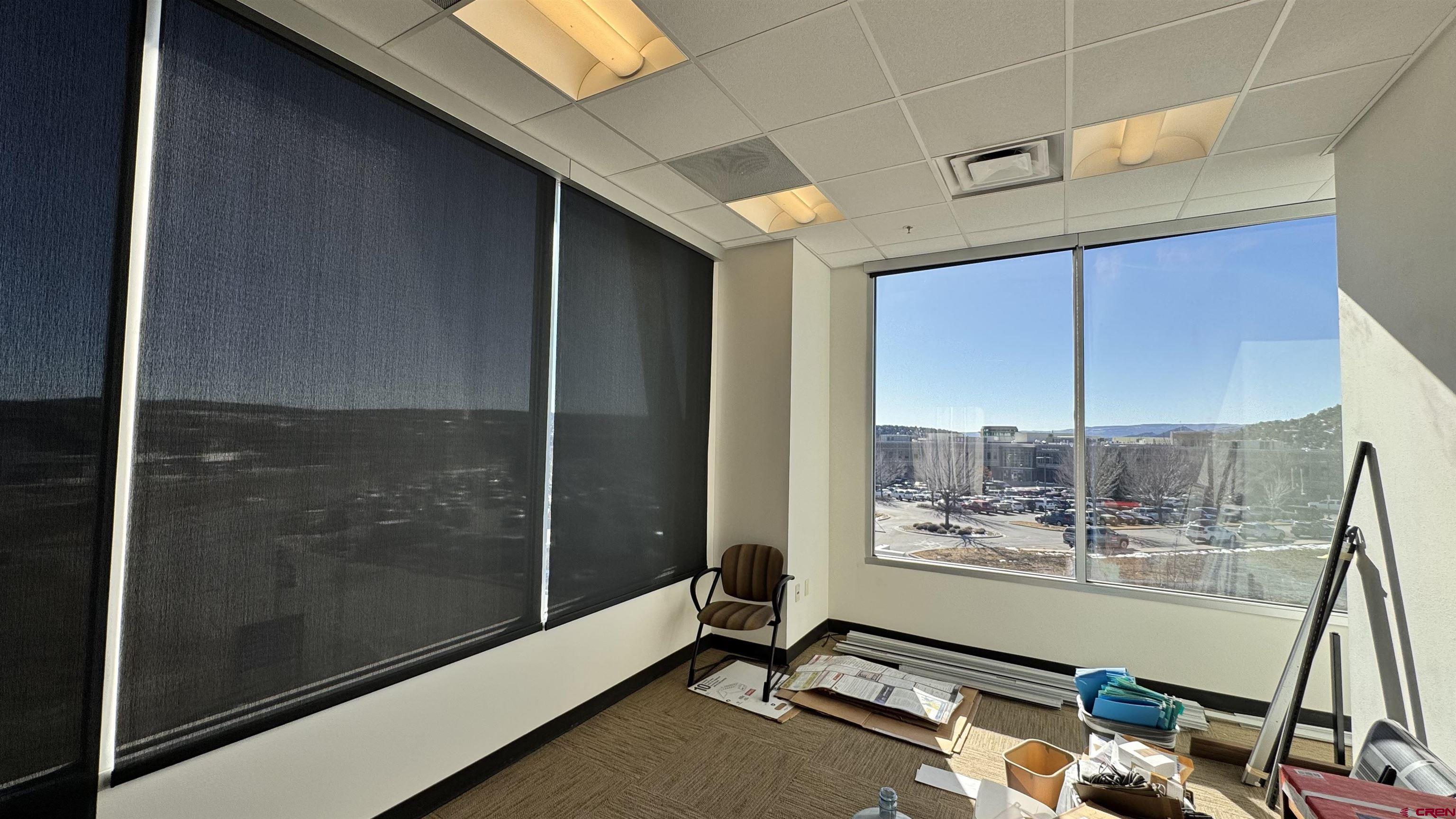65 Mercado Street, Unit 225 Durango, CO 81301 - Photo 11 of 18 a room with gym equipment and large mirror