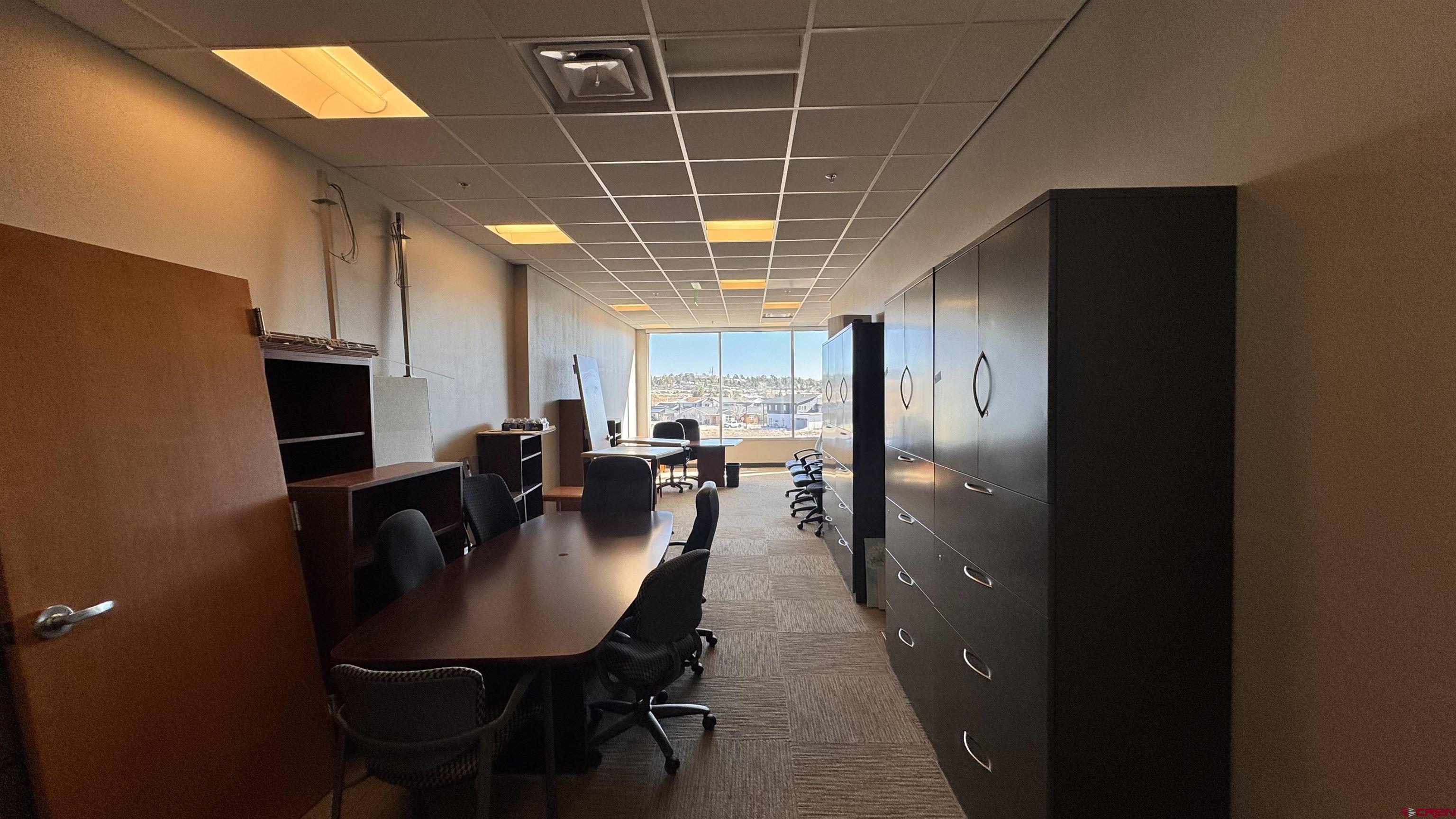 65 Mercado Street, Unit 225 Durango, CO 81301 - Photo 14 of 18 a view of a dining room with furniture
