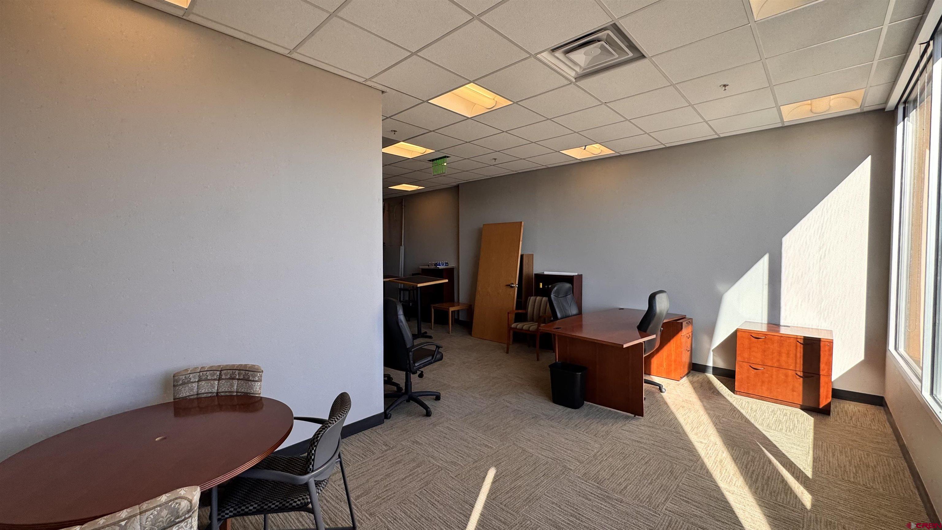65 Mercado Street, Unit 225 Durango, CO 81301 - Photo 4 of 18 a workspace with furniture and a window