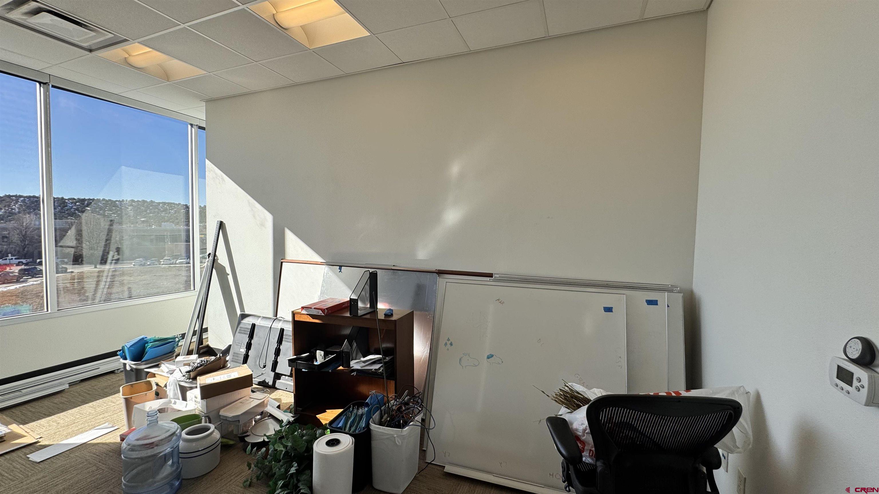 65 Mercado Street, Unit 225 Durango, CO 81301 - Photo 8 of 18 a view of a workspace with furniture and a window