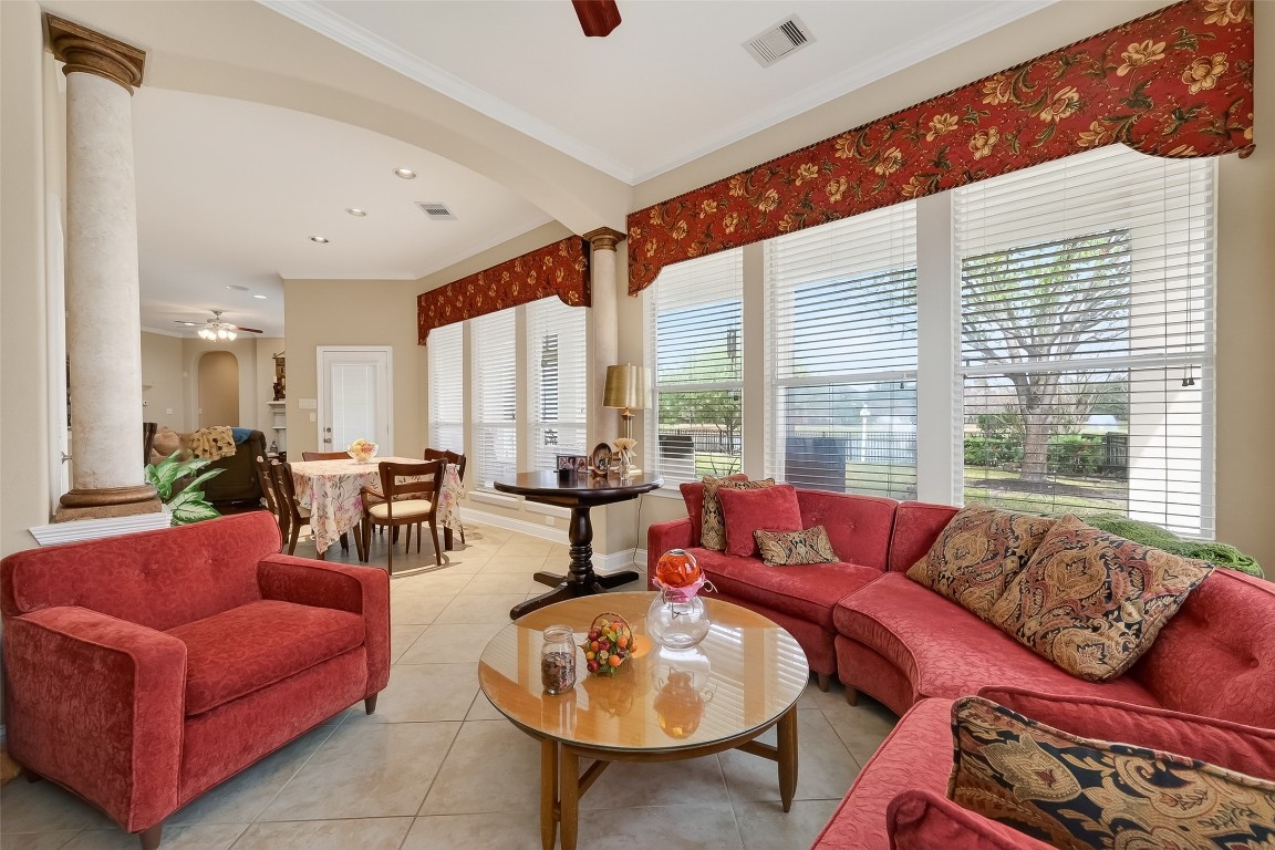 18622 Yorkshire Manor Court Spring, TX 77379 - Photo 17 of 41 a living room with furniture and a large window