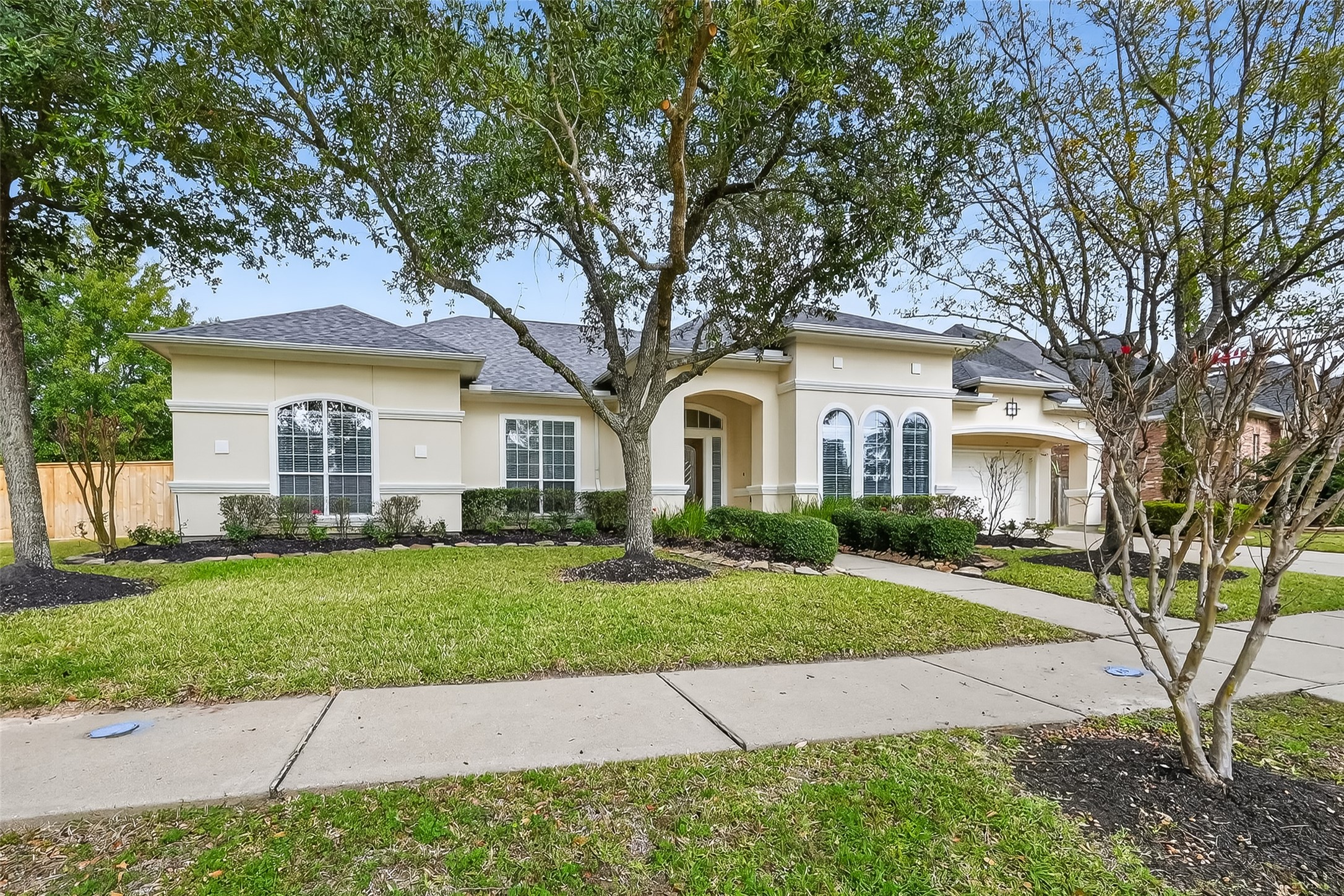 18622 Yorkshire Manor Court Spring, TX 77379 - Photo 3 of 49 a front view of a house with a yard