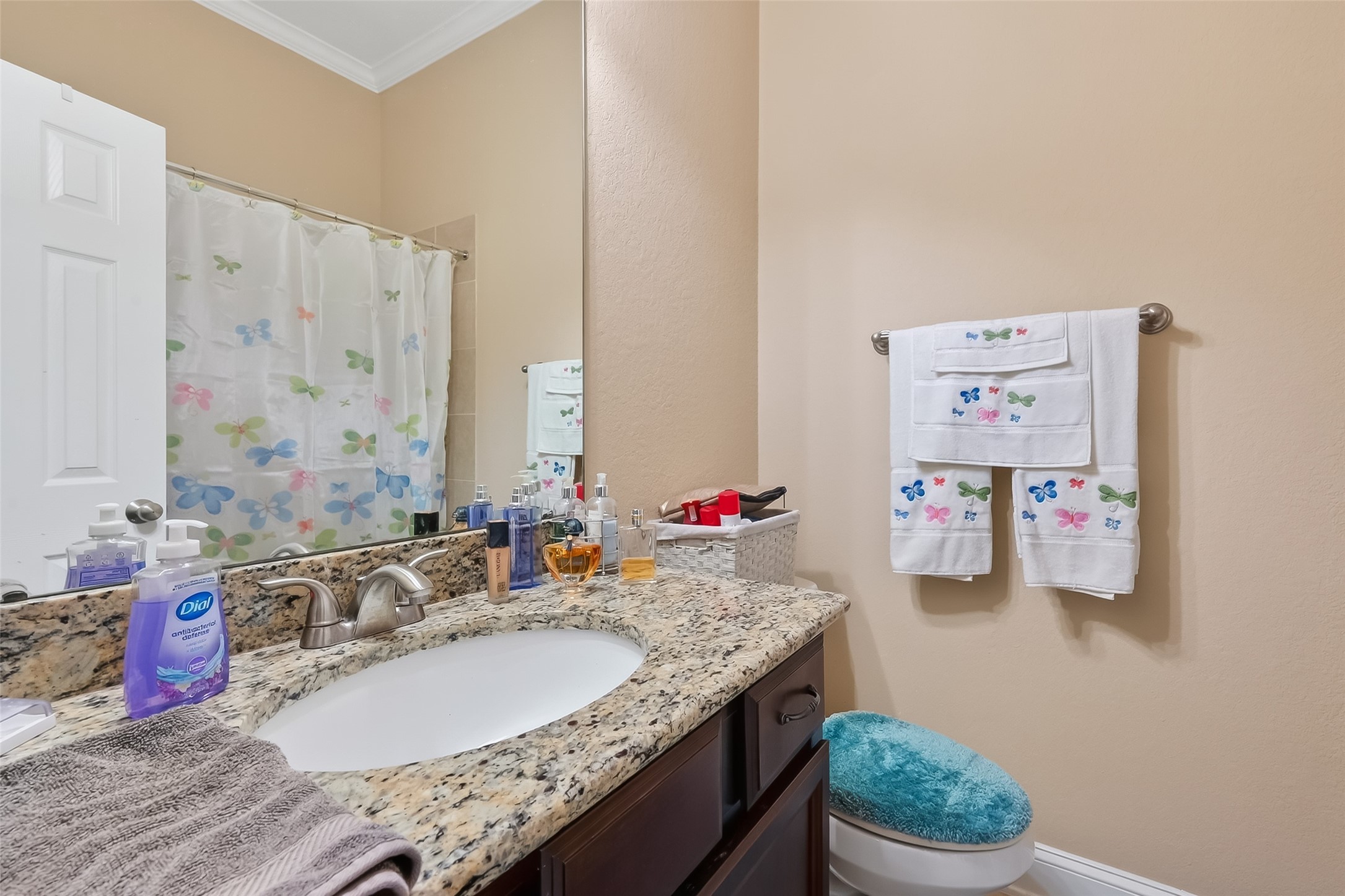 18622 Yorkshire Manor Court Spring, TX 77379 - Photo 36 of 49 a bathroom with a granite countertop sink and a mirror