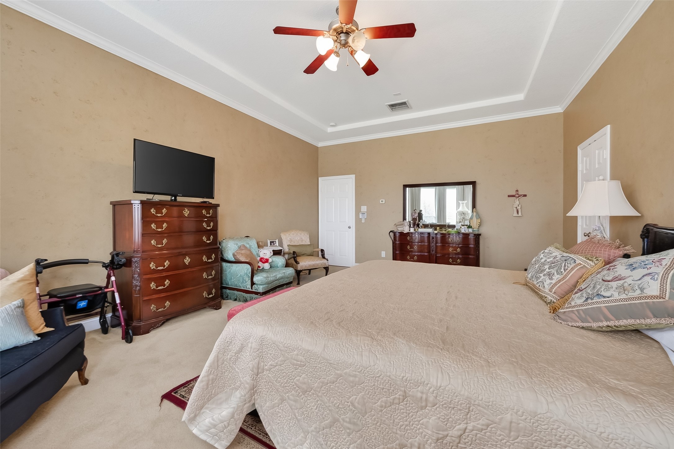 18622 Yorkshire Manor Court Spring, TX 77379 - Photo 39 of 49 a bedroom with a bed and a television