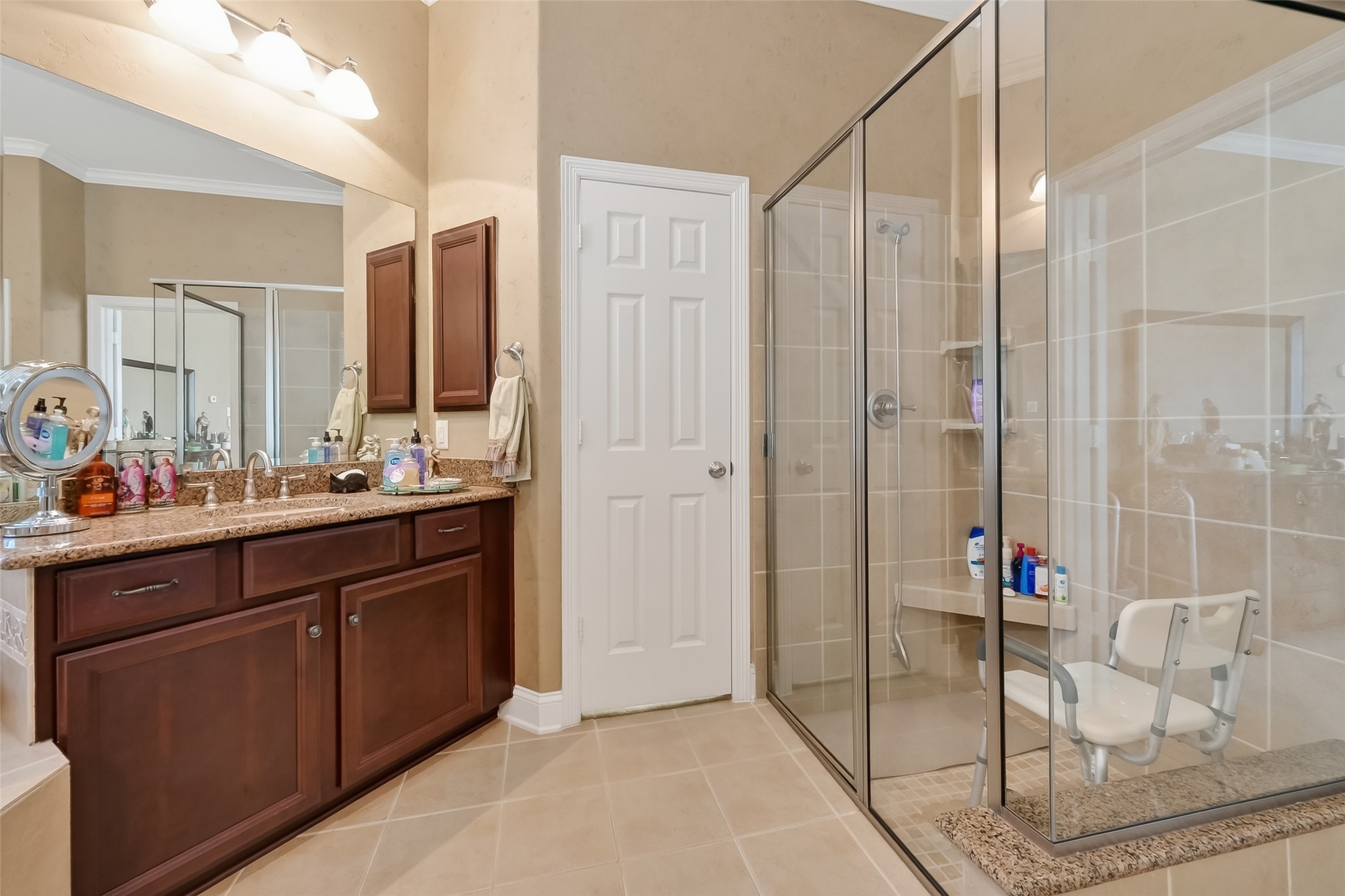 18622 Yorkshire Manor Court Spring, TX 77379 - Photo 42 of 49 a bathroom with a shower and a sink