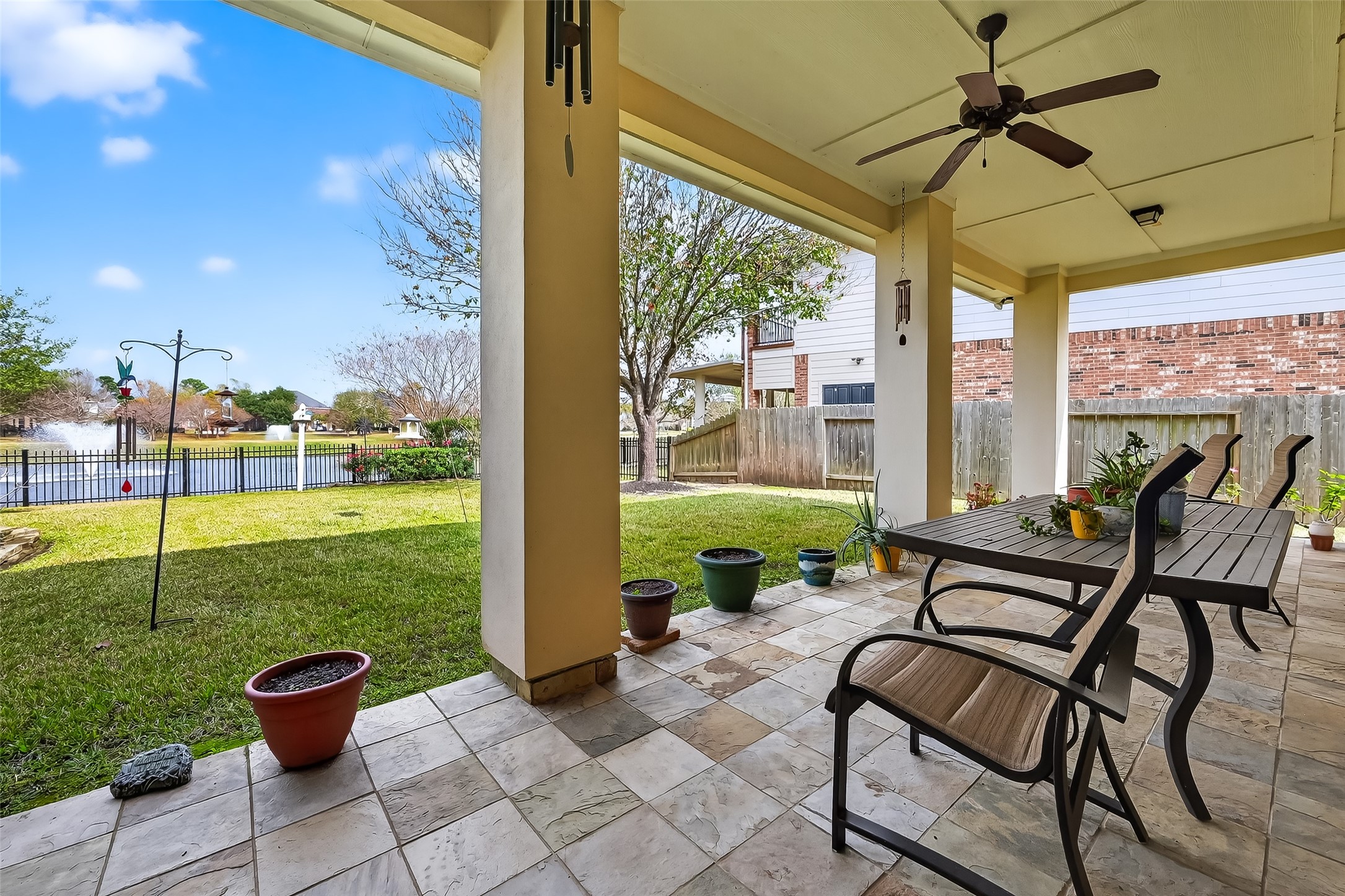 18622 Yorkshire Manor Court Spring, TX 77379 - Photo 43 of 49 a view of a patio with chair and table