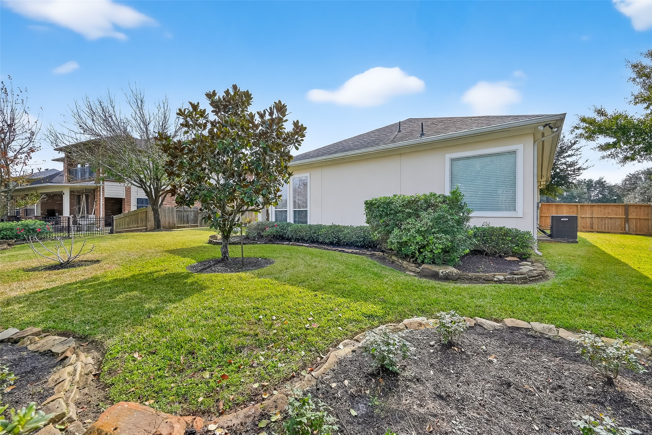 18622 Yorkshire Manor Court Spring, TX 77379 - Photo 47 of 49 a front view of a house with a yard and garage