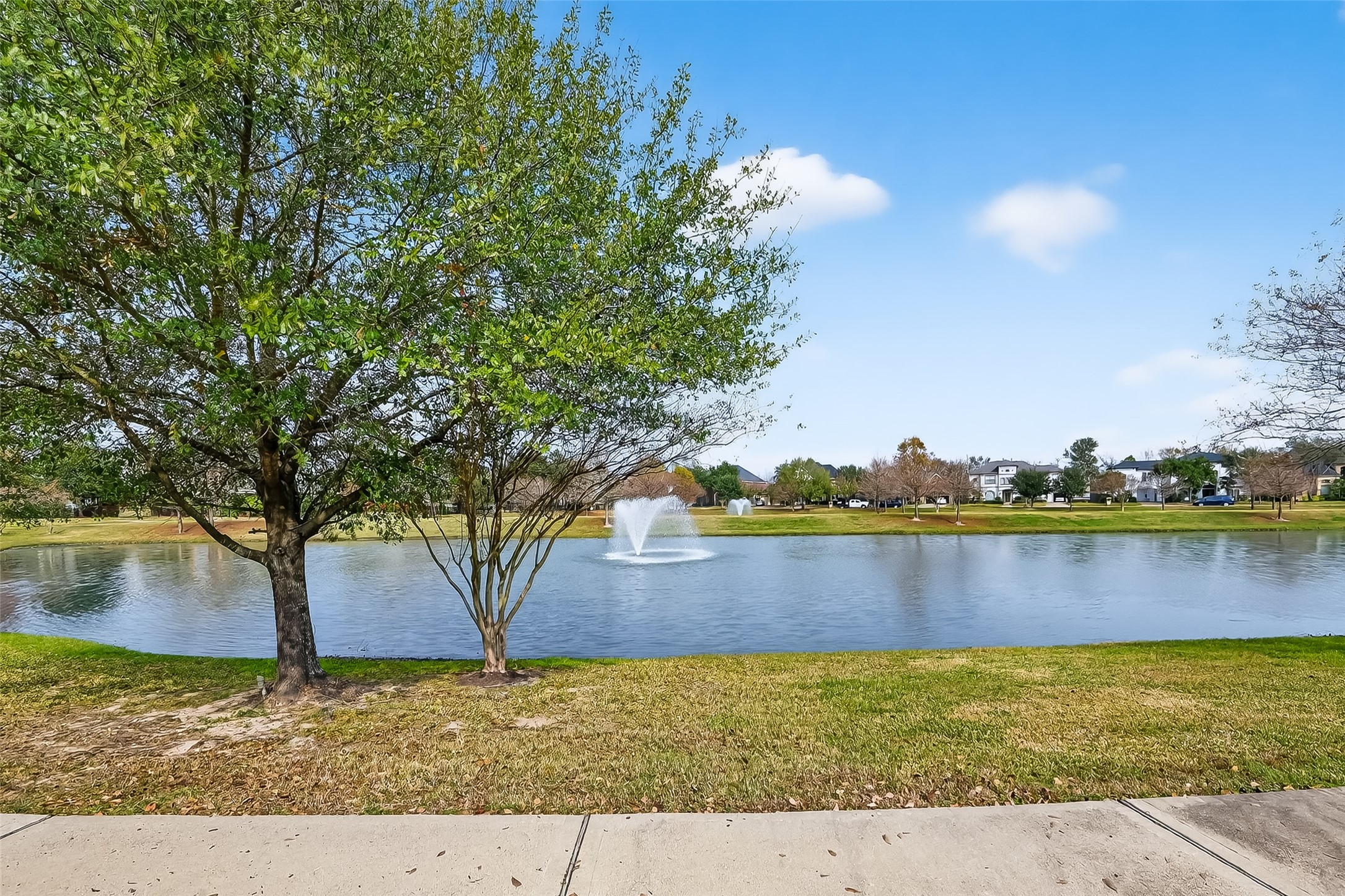 18622 Yorkshire Manor Court Spring, TX 77379 - Photo 49 of 49 a view of lake with a house in the background
