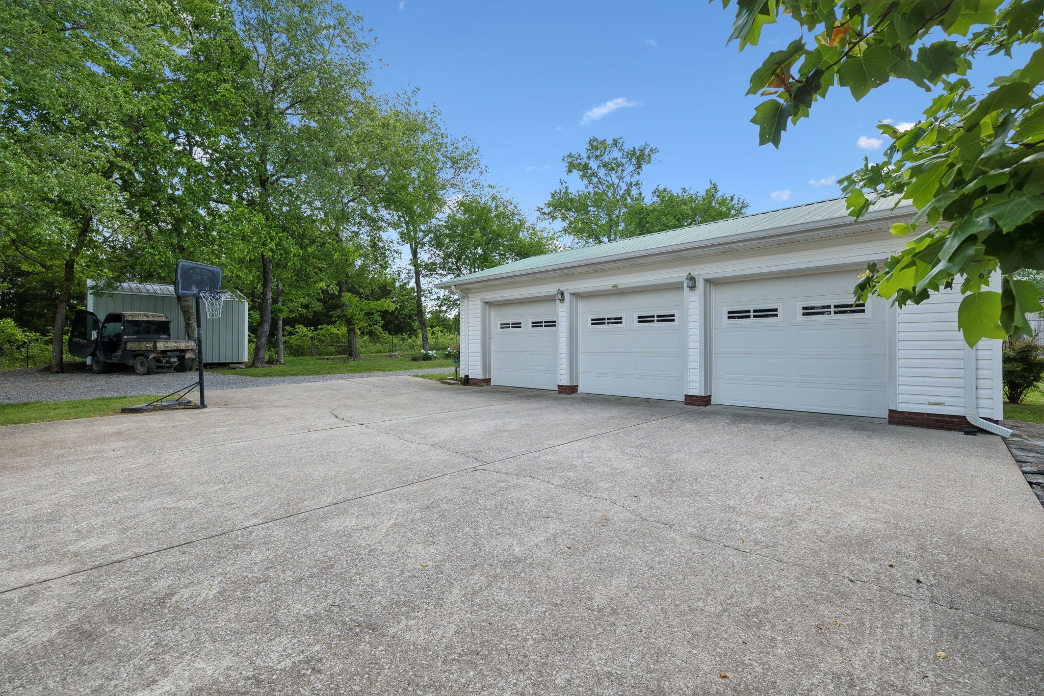 1494 Grant Road Watertown, TN 37184 - Photo 2 of 95 a view of a house with a backyard and garage