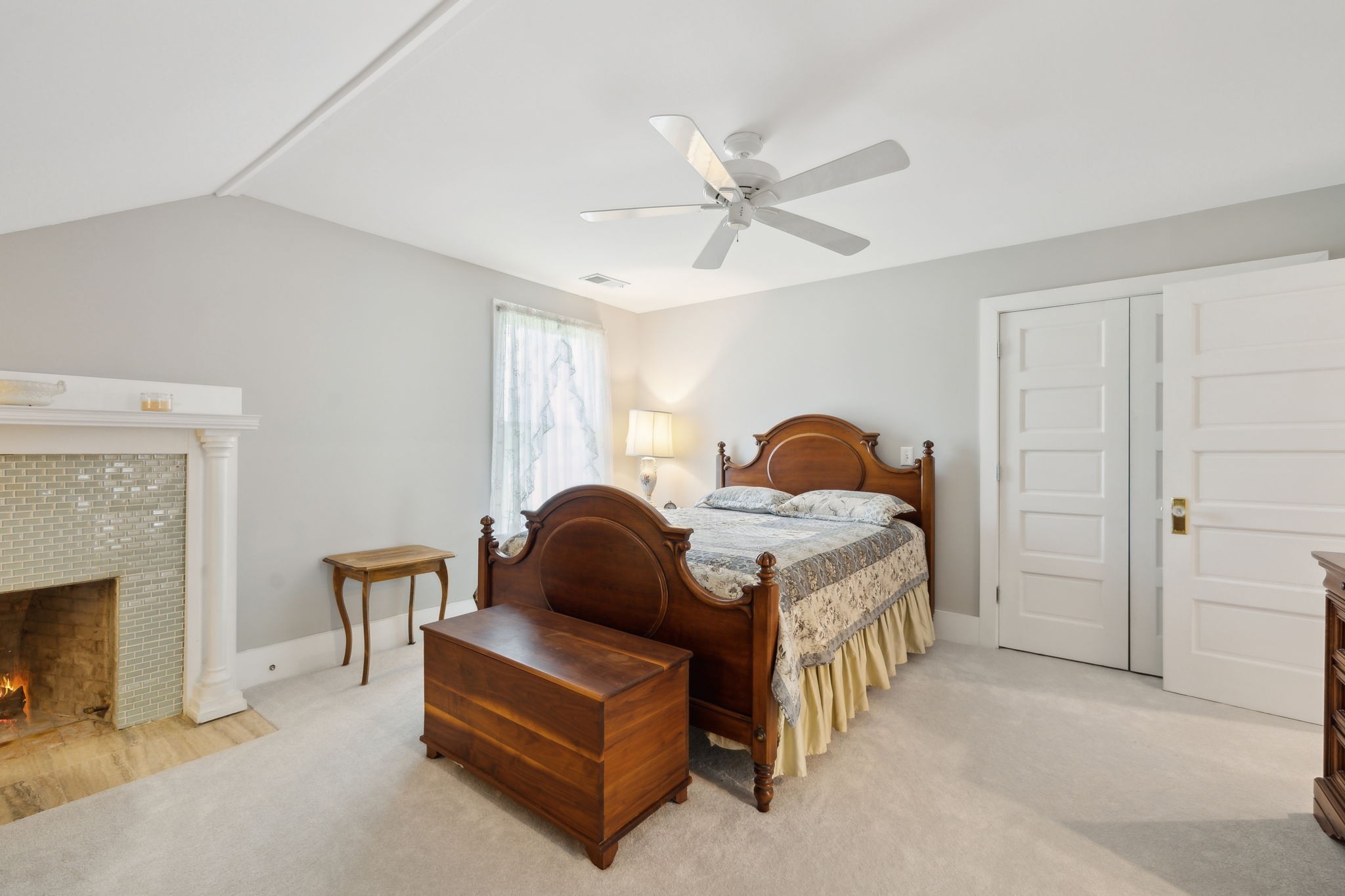 1494 Grant Road Watertown, TN 37184 - Photo 32 of 95 a bedroom with a bed and a fireplace