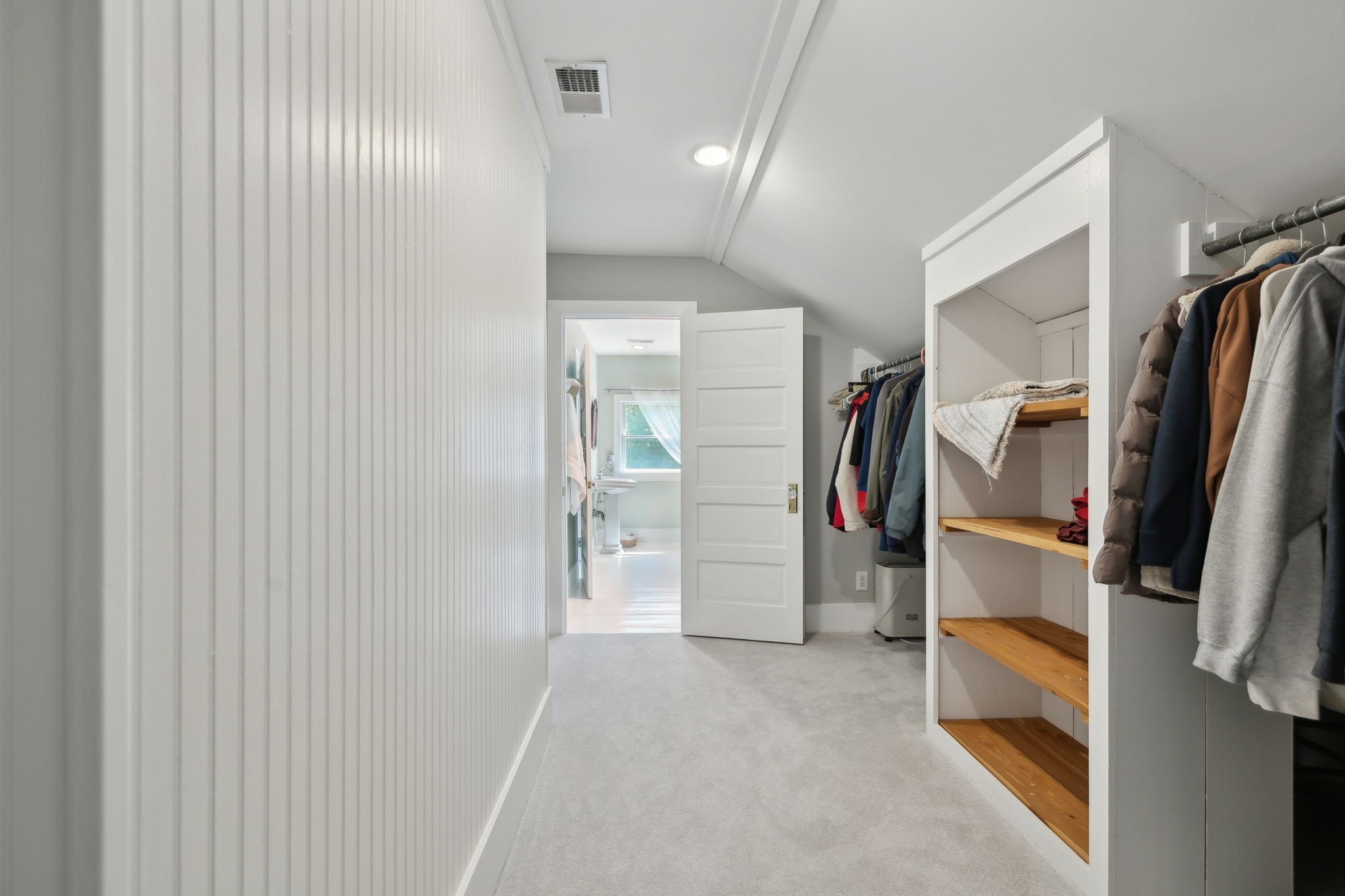 1494 Grant Road Watertown, TN 37184 - Photo 33 of 95 a view of walk in closet with clothes