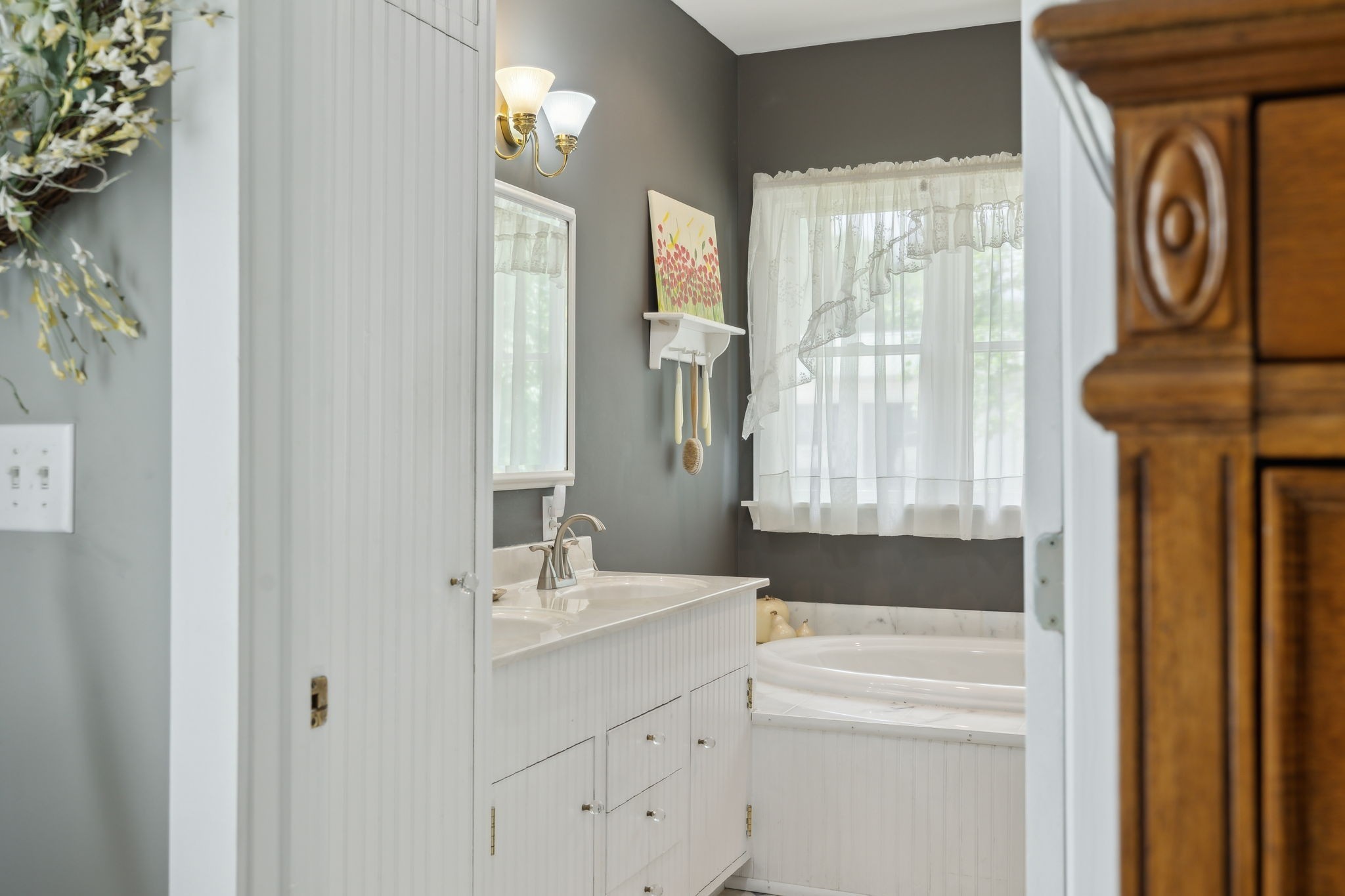 1494 Grant Road Watertown, TN 37184 - Photo 49 of 95 a bathroom with a sink a toilet and a mirror