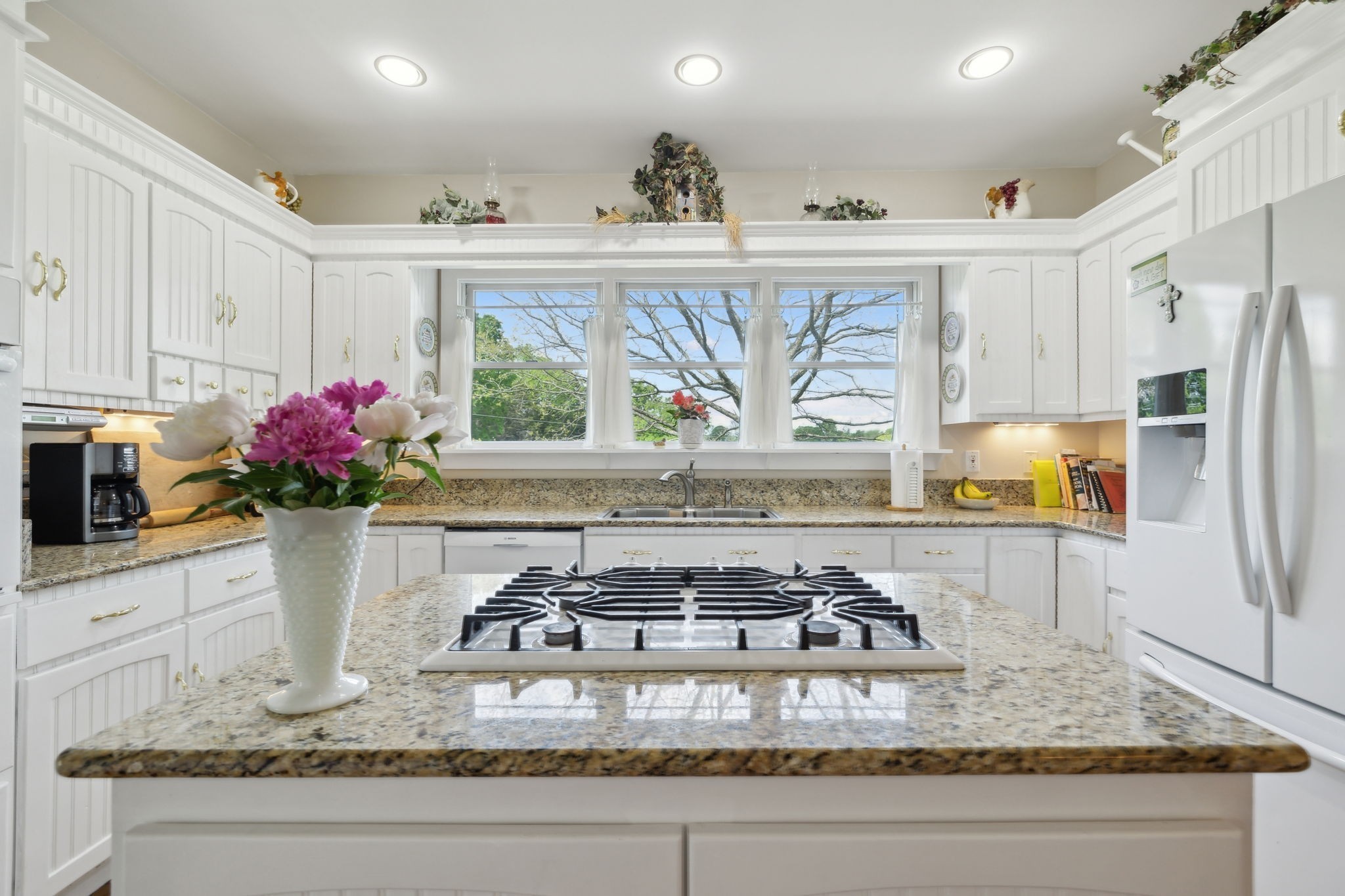 1494 Grant Road Watertown, TN 37184 - Photo 51 of 95 a kitchen with a stove a sink and a counter space