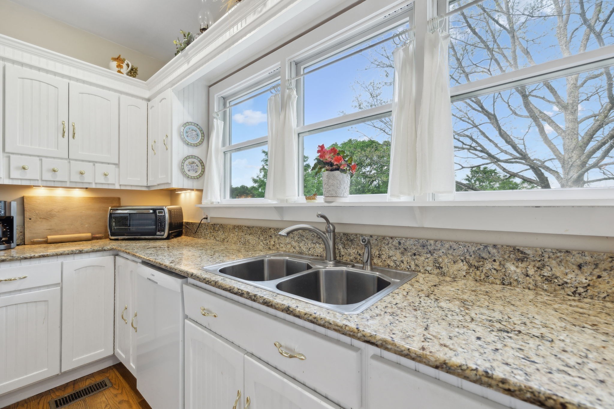 1494 Grant Road Watertown, TN 37184 - Photo 52 of 95 a kitchen with a sink and cabinets