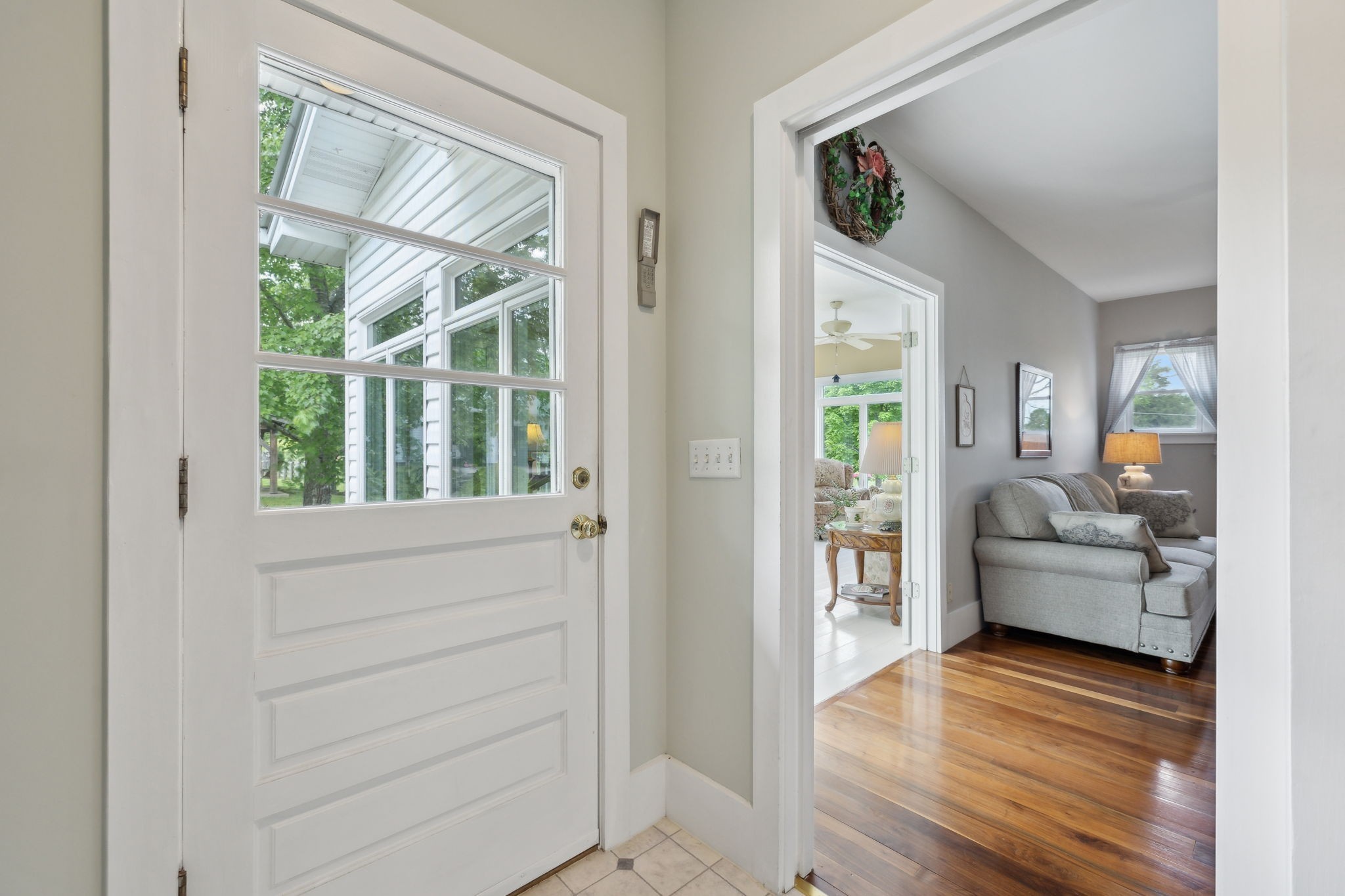 1494 Grant Road Watertown, TN 37184 - Photo 60 of 95 a living room with furniture and a large window with wooden floor