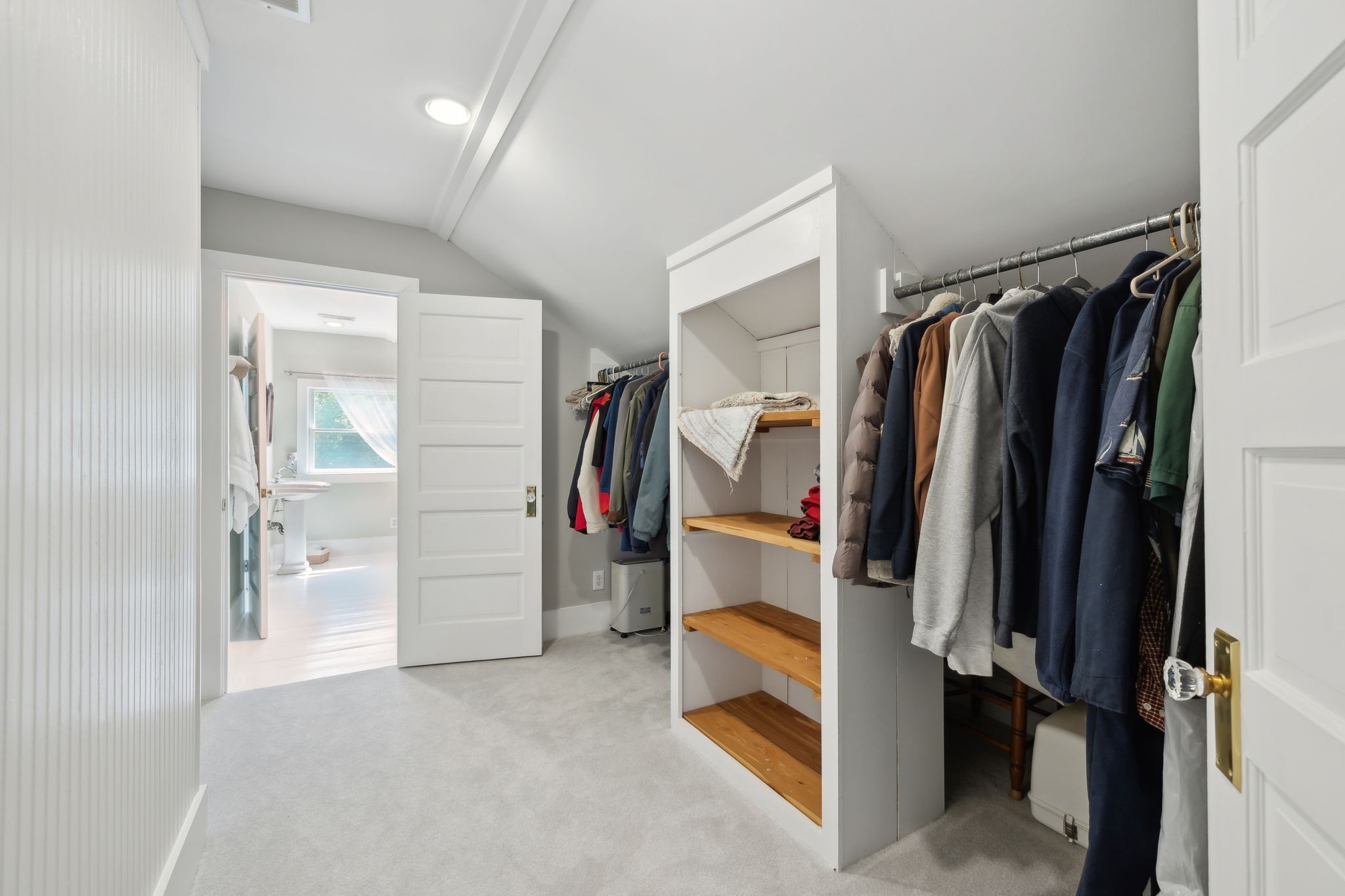 1494 Grant Road Watertown, TN 37184 - Photo 73 of 95 a view of walk in closet with clothes and shoes