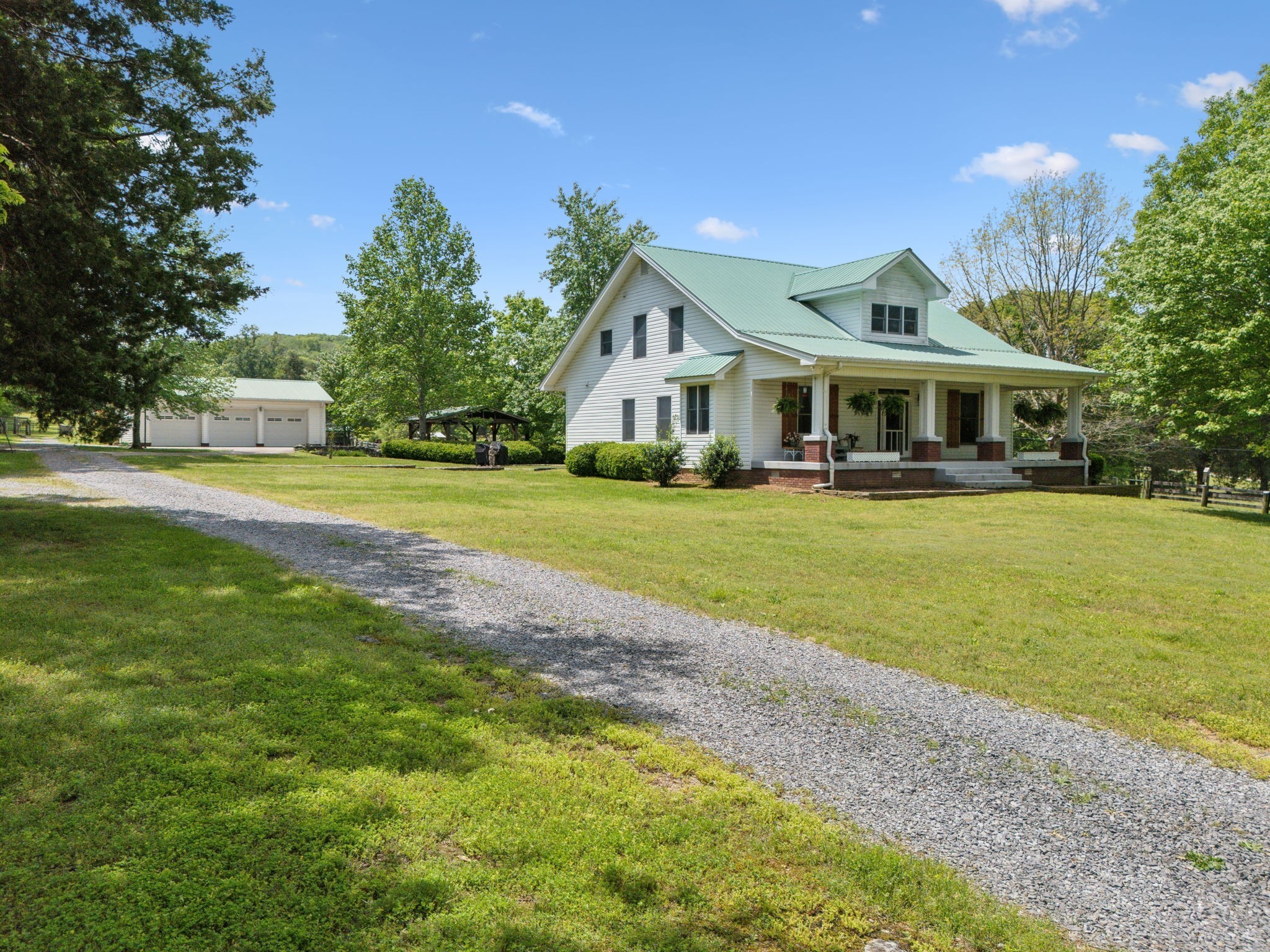 1494 Grant Road Watertown, TN 37184 - Photo 94 of 95 a front view of a house with a yard and trees