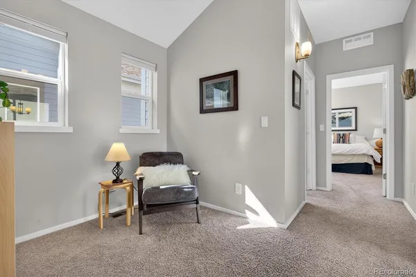 a bedroom with a bed and a cabinets