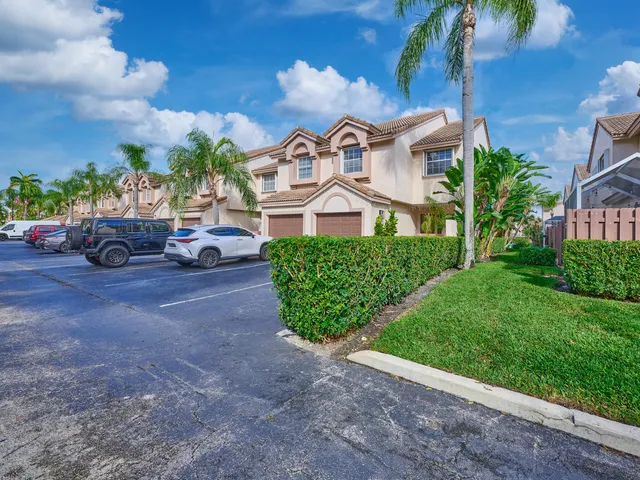 a bathroom with a toilet a sink and a mirror