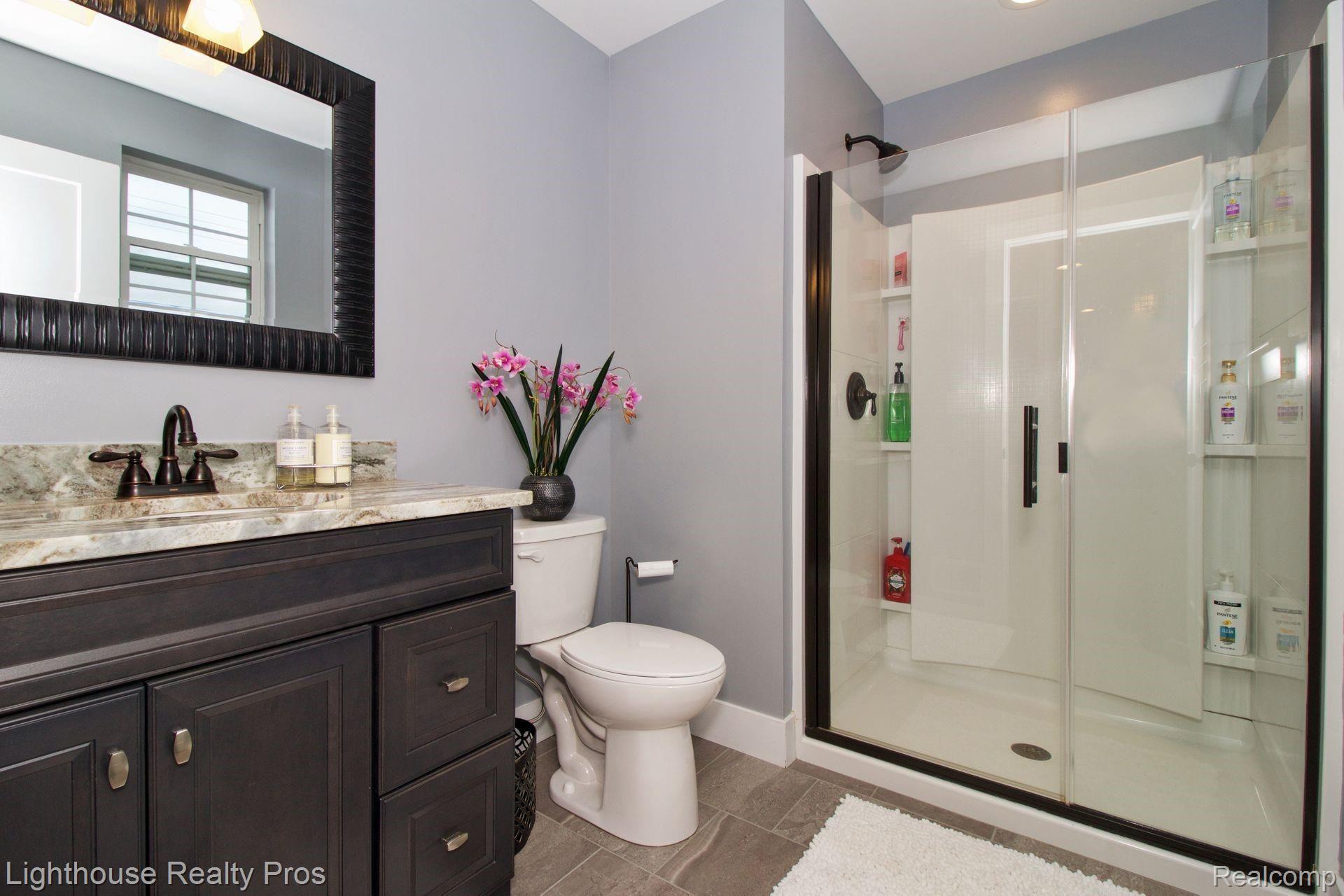 2897 Fisher Road Howell, MI 48855 - Photo 21 of 37 Master bath...everything fresh, clean, and new!