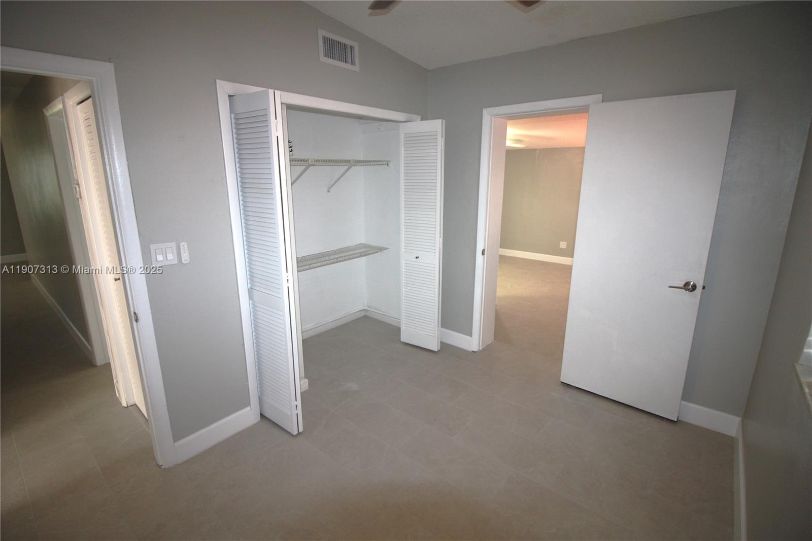 11031 Southwest 43rd Street Miami, FL 33165 - Photo 9 of 31 Hallway Entry to Master