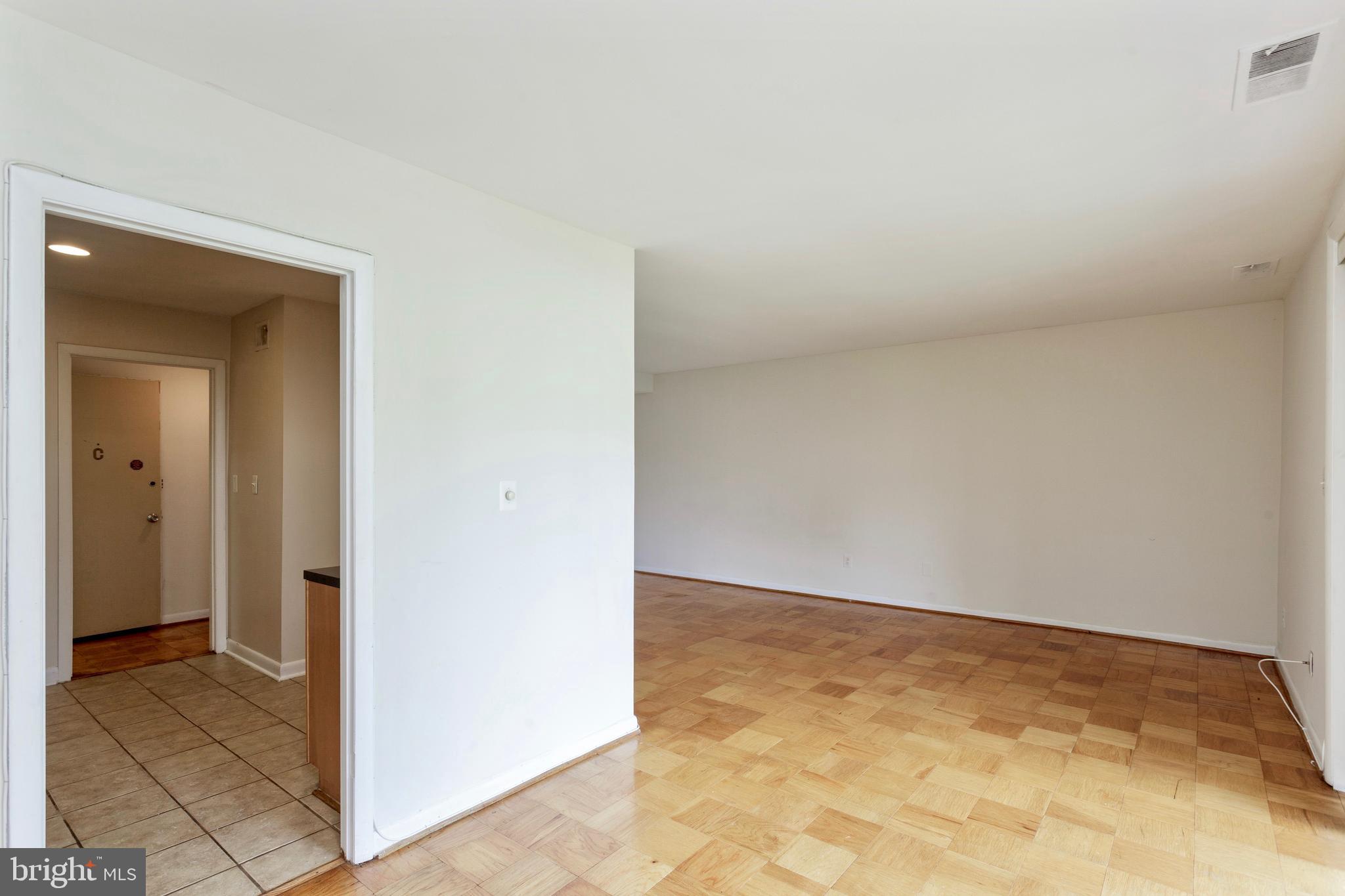 6 Cross Keys Road, Unit 6C Baltimore, MD 21210 - Photo 10 of 36 View from the Dining Rm thru to the Liv Rm & Kit