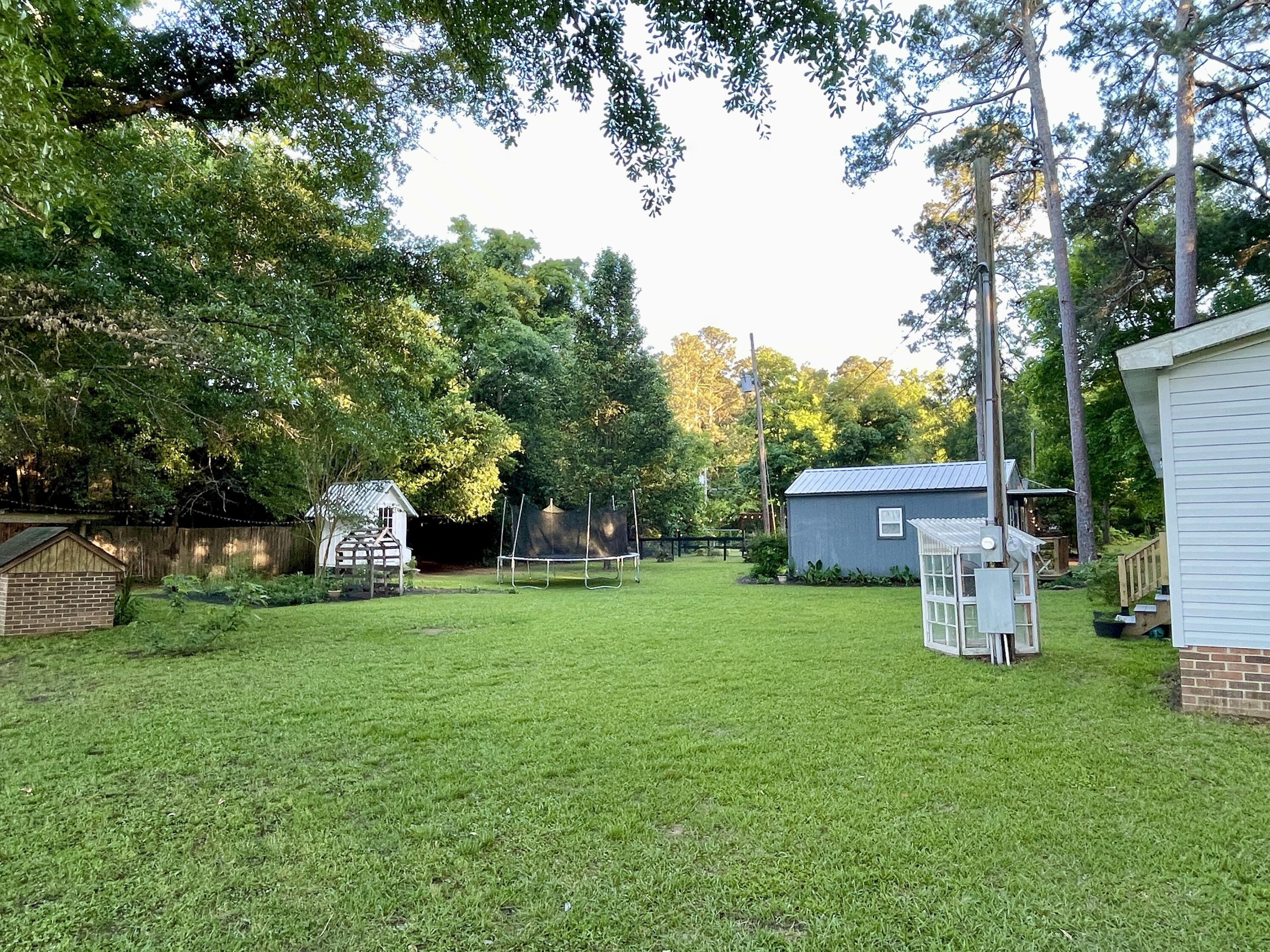 2166 Healing Springs Road Blackville, SC 29817 - Photo 41 of 43 a view of a house with backyard and garden