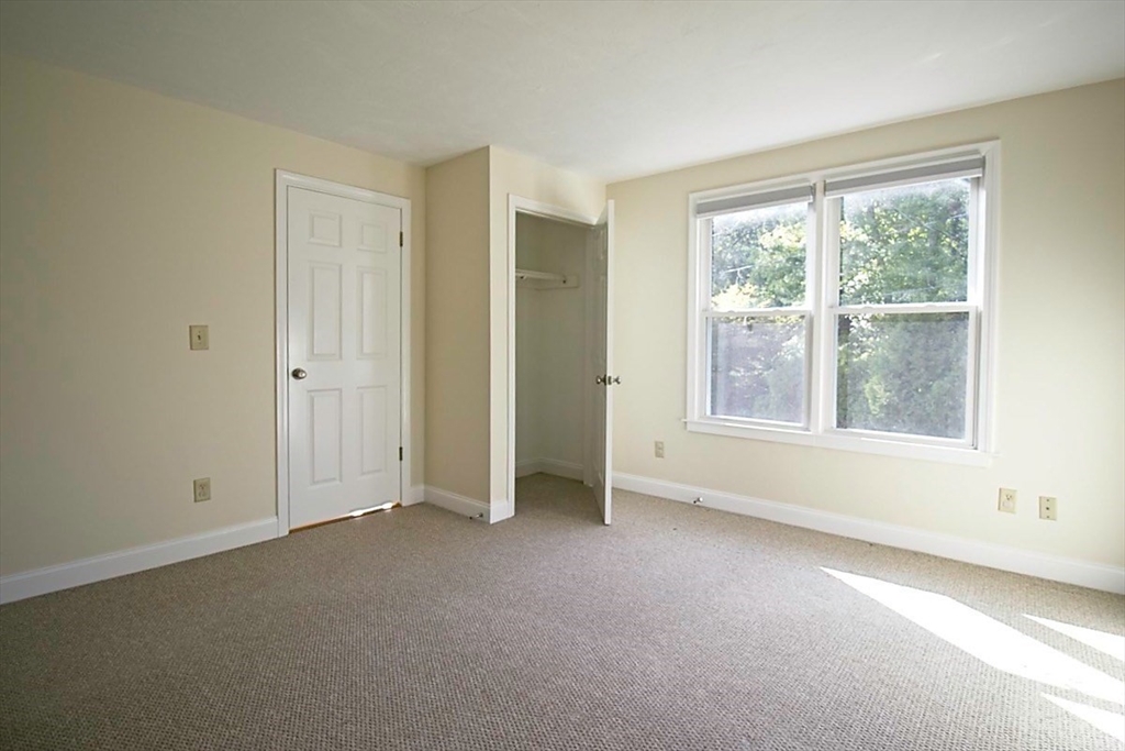 40 Quincy Street, Unit B Sharon, MA 02067 - Photo 7 of 10 an empty room with windows