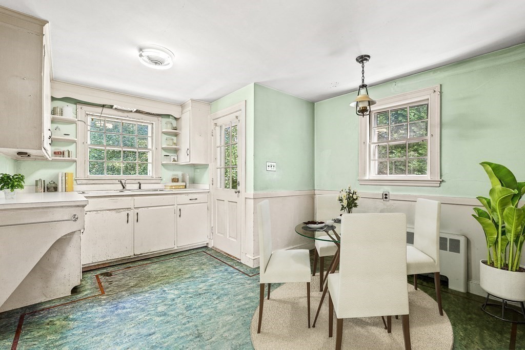 7 Spring Street Lexington, MA 02421 - Photo 6 of 25 a kitchen with a sink cabinets and window