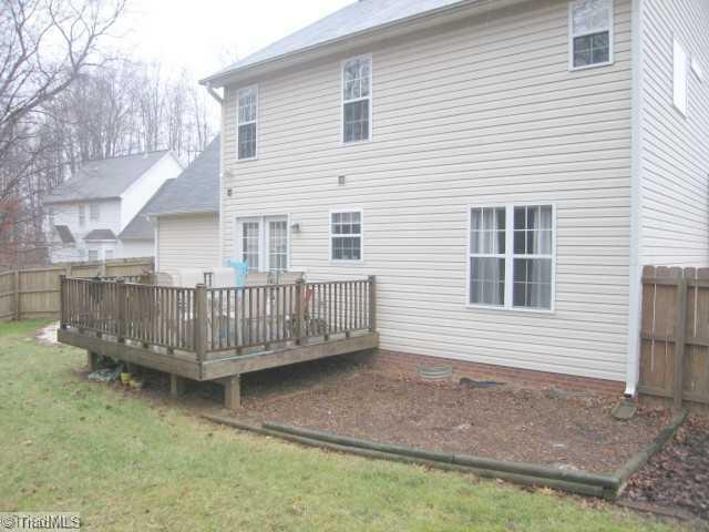 8110 Chestershire Road Oak Ridge, NC 27310 - Photo 14 of 16 Exterior Back.