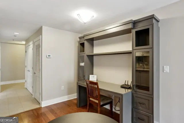 a room with a bench and furniture