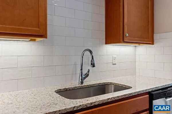 a kitchen with a stove and a microwave