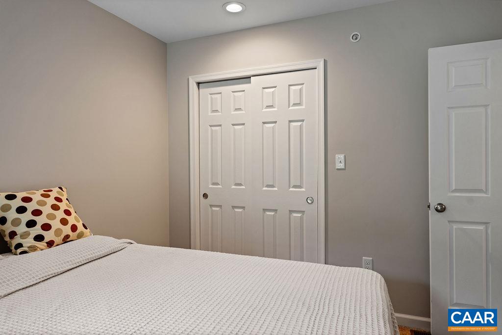 3234 North Ridge Roseland, VA 22967 - Photo 16 of 32 a bedroom with a bed and a closet