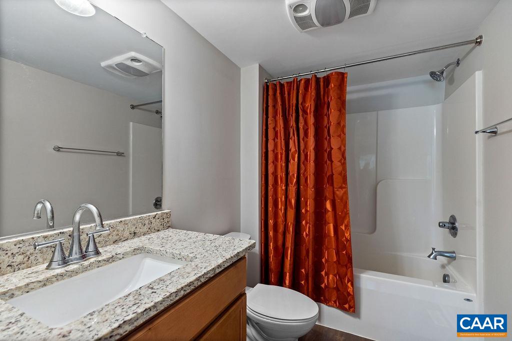 3234 North Ridge Roseland, VA 22967 - Photo 21 of 32 a bathroom with a granite countertop sink toilet and shower