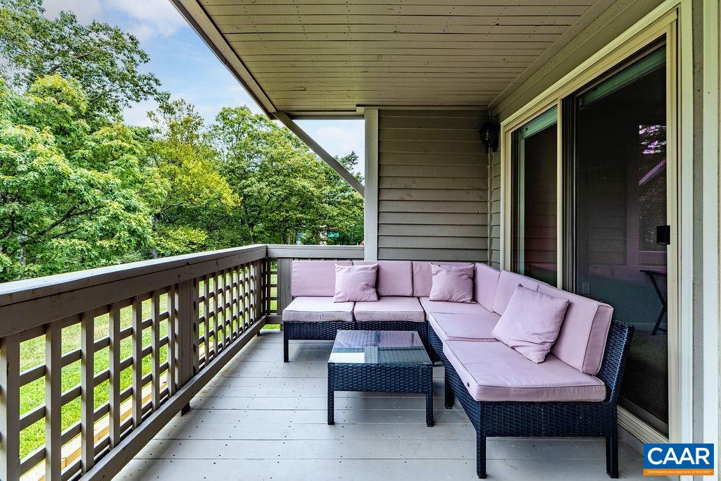 3234 North Ridge Roseland, VA 22967 - Photo 29 of 32 a balcony with wooden floor and furniture